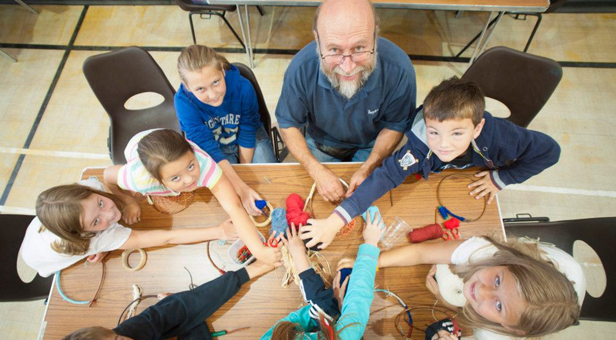 A photograph of children taking part in the Art Week activities