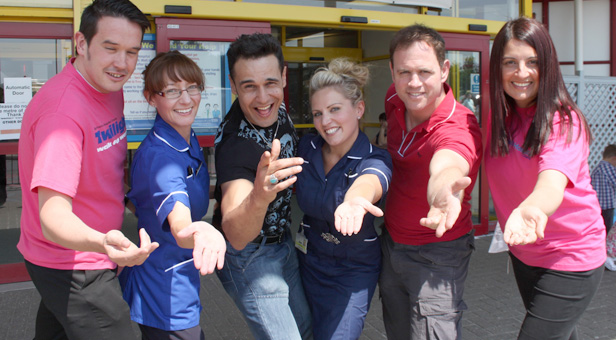 Chico and Kyran with (l-r) Barry Wilson, fundraising officer, senior nurse Zoe Clark, Clinical Leader Lindsay Baker, and Fundraising Manager Lindsey Sturman