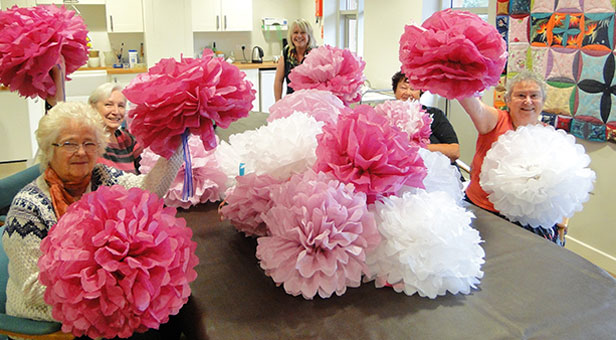 Hospice Art Group with pom-poms