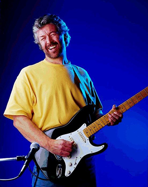 Mike Hall as Eric Clapton