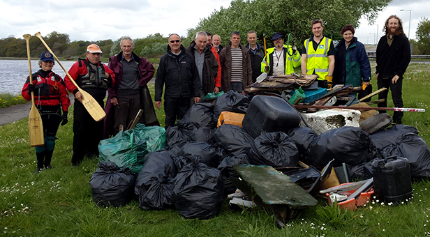 Volunteers helping out at Holes Bay beach clean