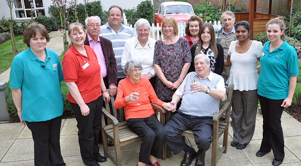 Betty and Fred Aldred with relatives, friends and staff at Colten Care's Fernhill home