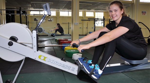 Lizzie Lander training on an indoor machine at her school, the LeAF Studio in Bournemouth
