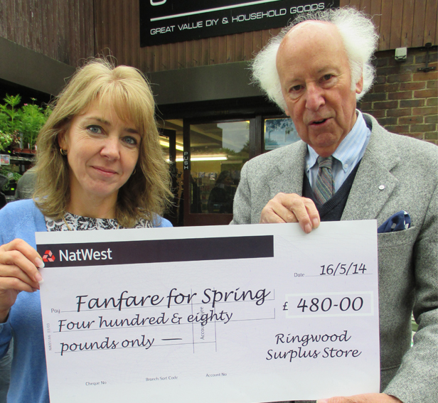 Pictured Nicki Foaks of Ringwood Surplus Stores presenting cheque to Roger Bettle organiser of Fanfare for Ringwood