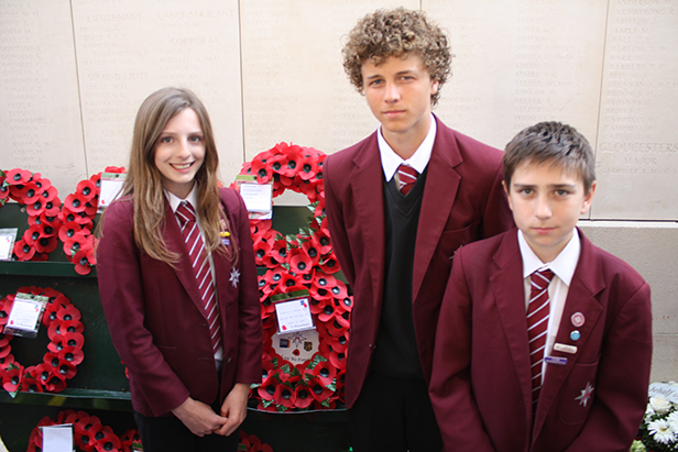 Three of The Arnewood School's WWI ambassadors (from left to right) Libby Jenner, Rafferty Huseey and Alfie Bloor, lay a wreath at the Menin Gate, near Ypres.