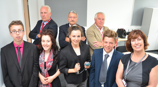 (rear from left) Dragons Danny Godfrey, Peter Matthews, John Knowles with contestants (front from left) Danny Gunn, Alice Keeble and winner Libbie Sinclair, Ben Keeble and head of business studies Caroline Kurtulan