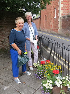 Volunteers Ann Sheldrake (left) and Olive Glancy were out early doing some last minute tidying up