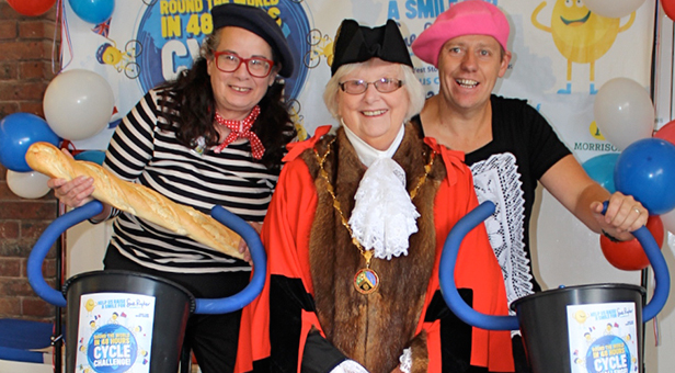 Morrisons community champion Jenny Cook with the Mayor of Verwood, deputy store manager John Camish and Henri