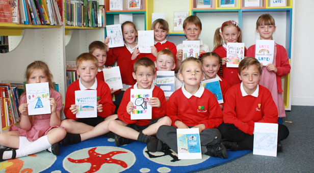 Pupils from Sylvan Infant School with their published books at Poole Central Library
