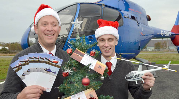 (from left) Operations Manager Nick Bird and Ollie Pennington promote festive gift flights for budding pilots