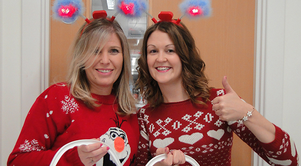 Sally Goodenough and Louise Jones from Lewis-Manning's Fundraining Team in their Christmas Jumpers