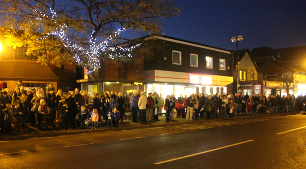 Families line Victoria Road waiting for Santa