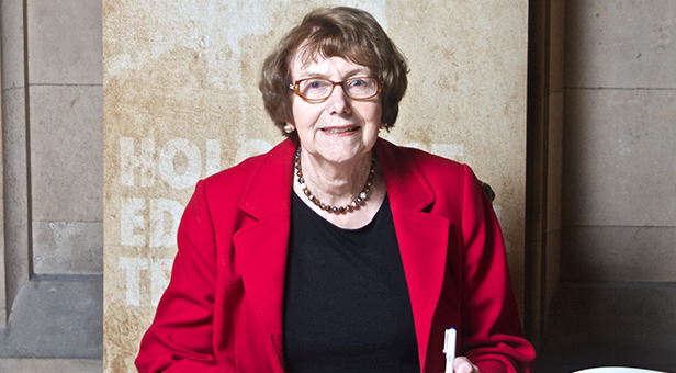 Annette Brooke MP signing the Holocaust Educational Trust Book of Commitment