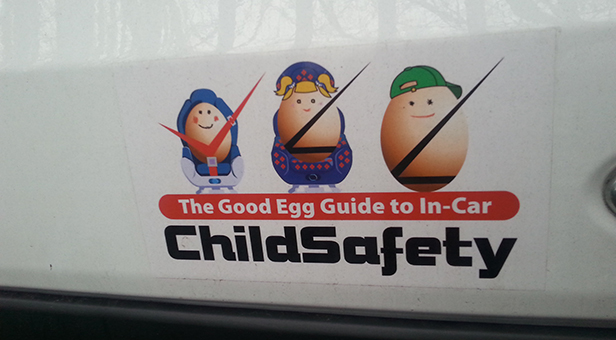 A photo of the egg cartoon sticker on the back of Alexander’s van