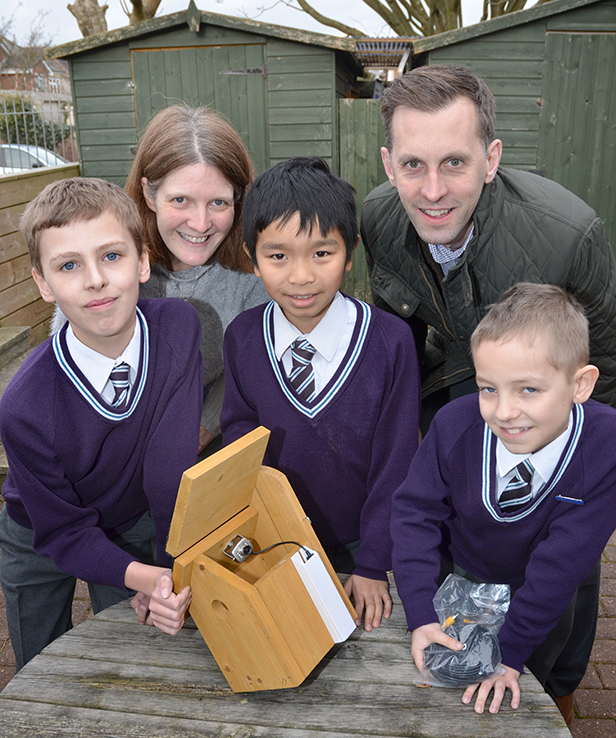 Alex Bushnell, Christopher Yong and Luke Kelly examine their new nest box with Emma Haworth and Matt Hill