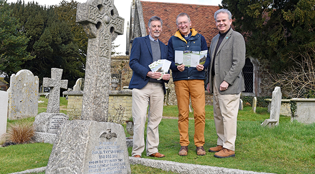 Frank Green, National Park archaeologist; Canon Stuart Holt, Fawley Church, and Julian Lewis MP stand by the grave of Samuel Kinkead