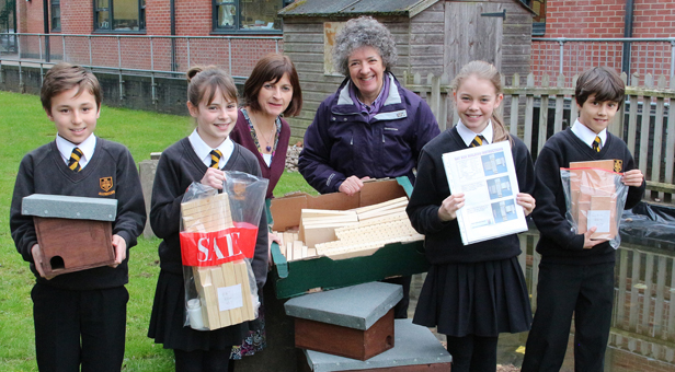 Pupils with teacher Sarah Hobson (left) and Beatrice Dopita from the River Allen Bat Roost