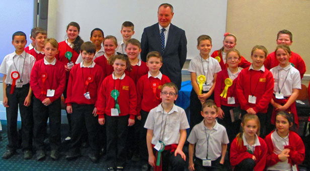 Children from the Elm Academy with Bournemouth West MP Conor Burns, during their visit to the Houses of Parliament.