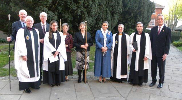 Suzie Allen with Deputy Lieutenant of Dorset, Minster Rector, Archdeacon of Sherborne, Rural Dean of Wimborne and Churchwardens from The Minster, Witchampton and Holt