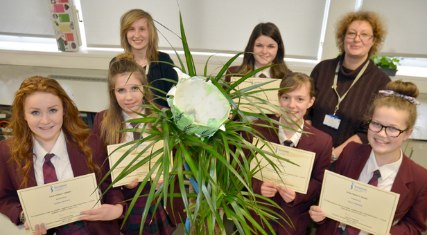 Year 9 winners (from left) Yasmin Dunning, Emily Hussey, Abigail Morton, Anna Saunders, Grace Barker with Rosanna Joyce (rear left) and Linda Green and their working model.