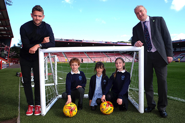 The winners with AFC Bournemouth’s Simon Francis