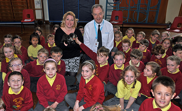 Donna Hill of Life Education Wessex, Bournemouth Water's David Harrison and Otto the Otter with pupils at Christchurch Infants School