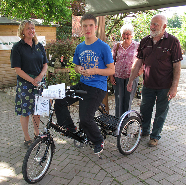 Callum Watson on his new tricycle