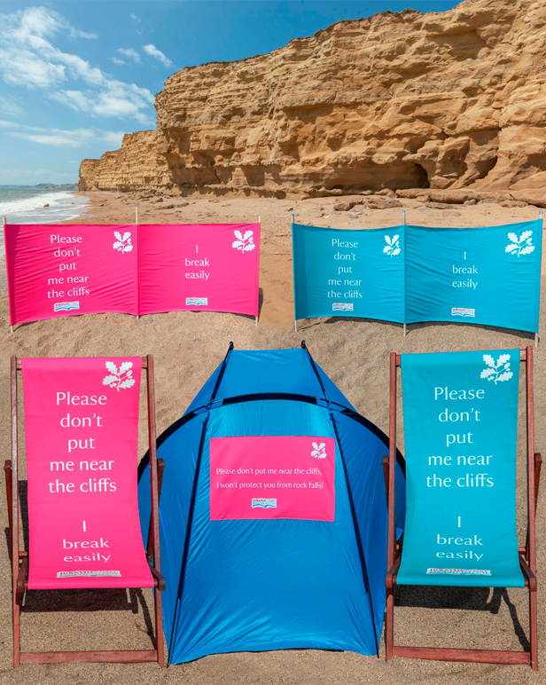 Deckchairs, windbreaks and shelters on the beach at Burton Bradstock © National Trust/Tony Gill