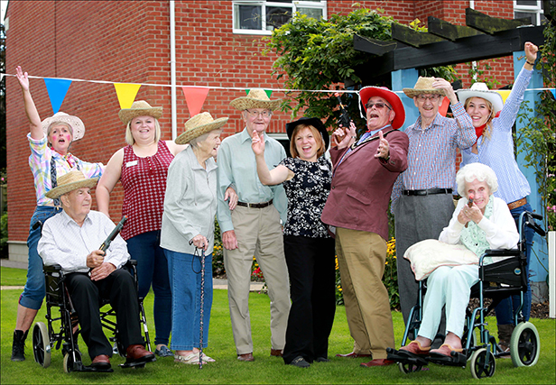 Colten Care's Kingfishers care home in New Milton held a cowboy themed summer barbecue to welcome back Home Manager Rebecca Hannam (centre) from maternity leave New Milton Mayor Cllr David Hawkins joined in the fun