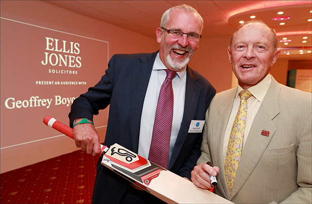 Cricketing legend Geoffrey Boycott OBE signs a cricket bat for Nigel Smith, Managing Partner, Ellis Jones