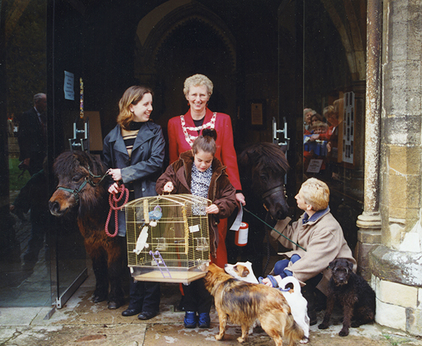 AT THE ENTRANCE OF THE MINSTER: A previous Animal Blessing Service organised by the then mayor of Wimborne Minster, Diann March