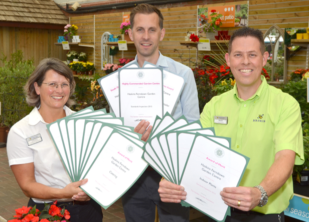 Restaurant supervisor Amanda Bartlett, Matt Hill and outdoor manager Kevin Holmes with the 18 merits 