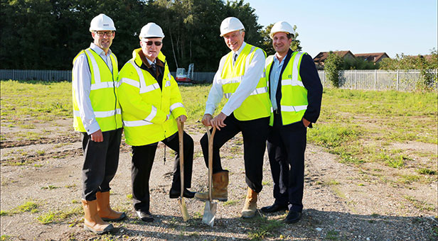 Colten Care founders Adrian Otten and John Colwell (centre left and right) with their sons and directors Rick Otten and George Colwell as work begins on the site of their new Ringwood offices