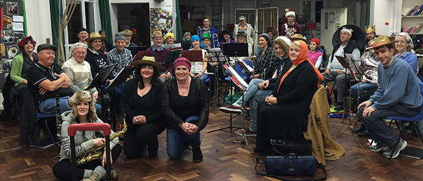Christchurch and District Band at their last rehearsal sporting headgear to support member
