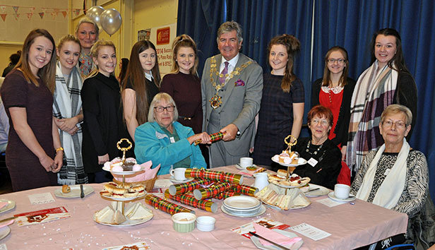 Students and party organisers join guests and the Mayor of Bournemouth, Cllr John Adams, for the Faithworks’ celebration event hosted by the LeAF Academy