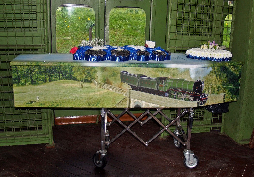 Rail enthusiast Mike Stollery who volunteered on the Swanage steam railway in Dorset for 44 years was taken to his funeral in a carriage he had restored himself. His coffin is pictured here in the train.