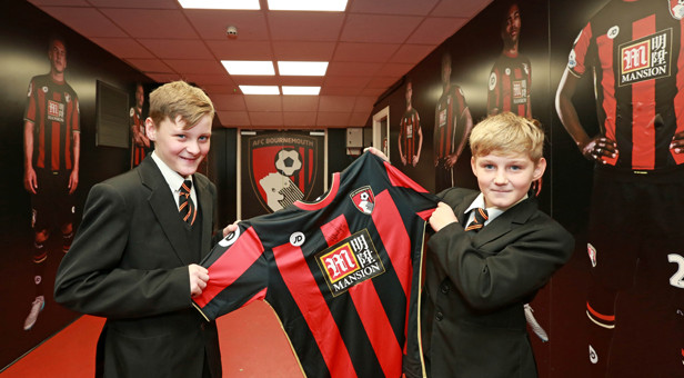 GETTING SHIRTY: St Aldhelm's was also presented with its own Cherries shirt which will be signed by the team and displayed at the Club