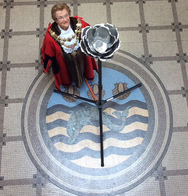 Mayor of Poole, Cllr Ann Stribley, with the special commemorative Beacon.