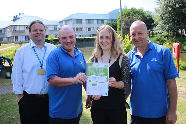 (From L-R) Trust Estates Manager Martin Lovell celebrates with colleagues Head Garderner David McInerney, Sustainability Manager Laura Dale and colleague in Estates Paul Fox