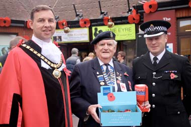 DORSET COUNTY LAUNCH OF THE NATIONAL POPPY APPEAL: L-R Mayor of Ferndown Cllr Mike Parkes, Mick Arnold MBE and Chief Superintendent Colin Searle outside the Barrington Theatre