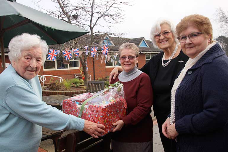 Celebrating 40 years as a Friend of St Leonards Hospital is Evelyn Stone, honorary secretary (left) receiving a long-service gift from Joan Proud, vice chair, Jacqueline Moss, chair and Jackie Nippard, committee member