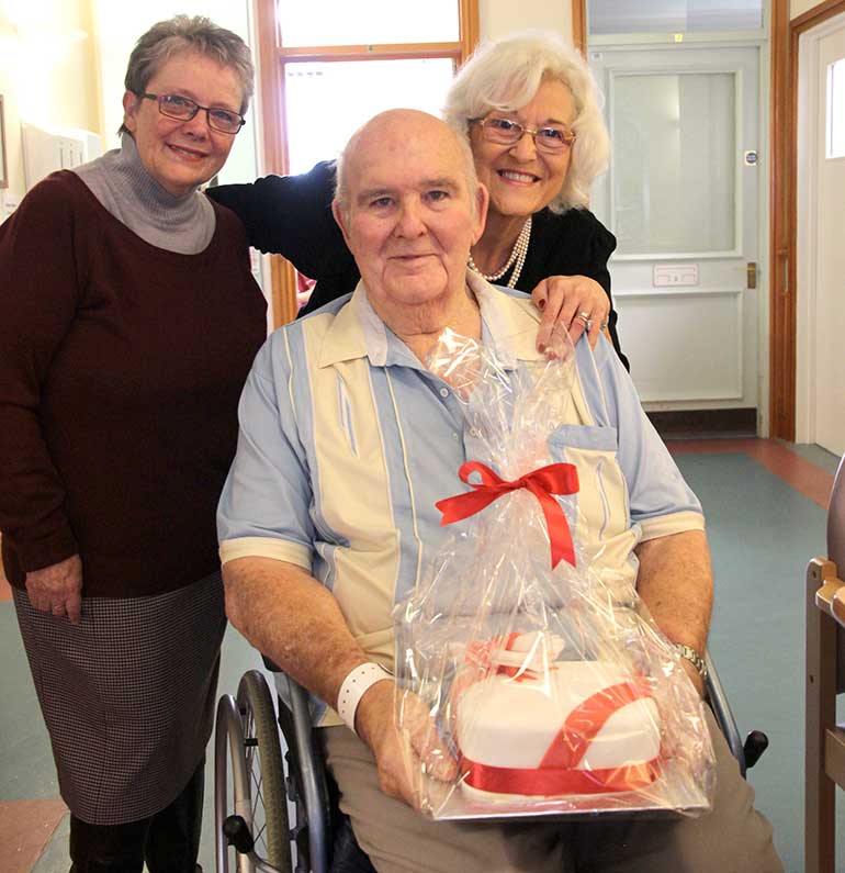 The winner of the Christmas cake in the raffle: Donald Tomkins from Mudeford who has been at St Leonard's hospital recovering from a fall which broke his hip in September. He has spent the last two weeks at St Leonards. He said, "I have enjoyed my stay at the hospital and am now looking forward to going home and spending Christmas with my family. Winning the cake has made my day."