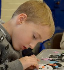 Pupils at Ringwood CE Infant School enjoy making Christmas decorations as part of their record-breaking fundraising efforts