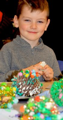 Pupils at Ringwood CE Infant School enjoy making Christmas decorations as part of their record-breaking fundraising efforts