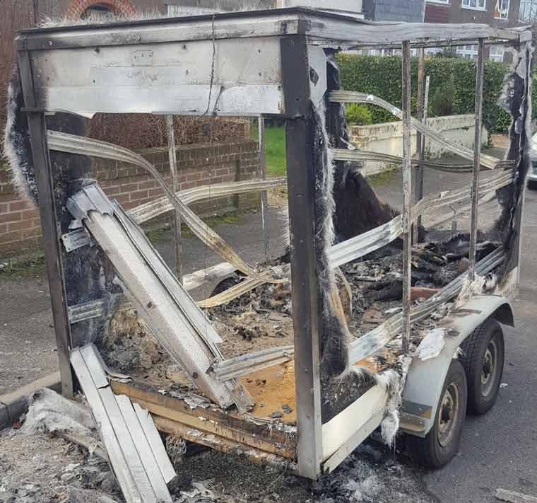 A large trailer set on fire and destroyed on Barnes Crescent