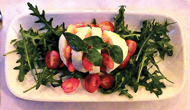 Buffalo mozzarella, cherry tomatoes and rocket