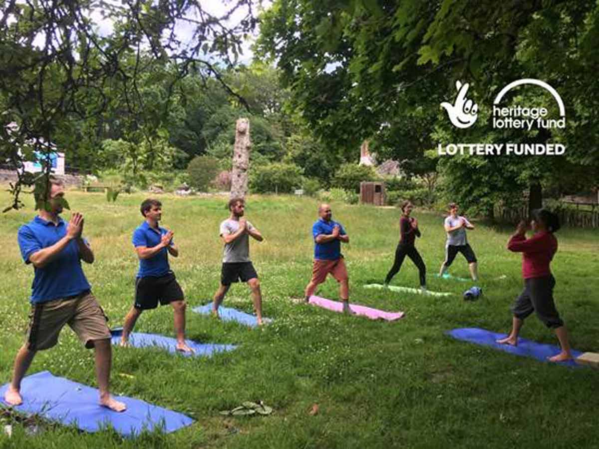 Members of the public enjoying outdoor yoga.