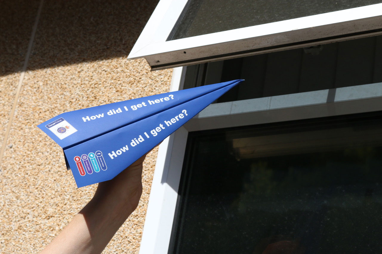 Dorset Police paper airplane open windows and doors