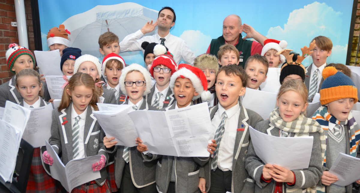 Angelic singing raises funds and Christmas boxes for charities