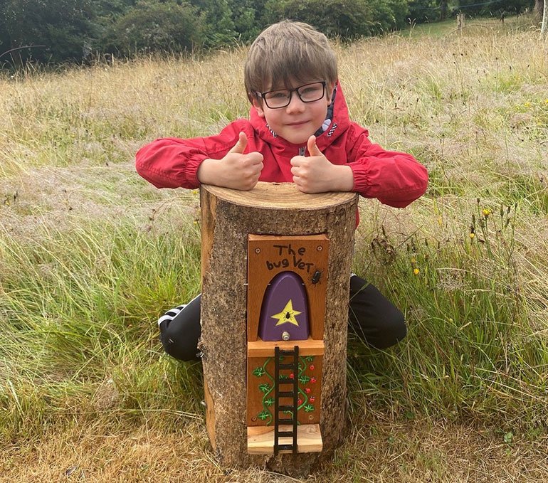 Finlay Guppy gives his fairy door the thumbs up